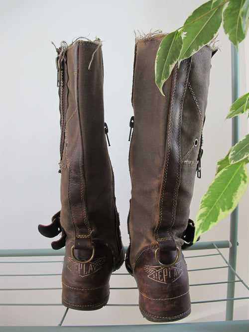 Brown buckled boots